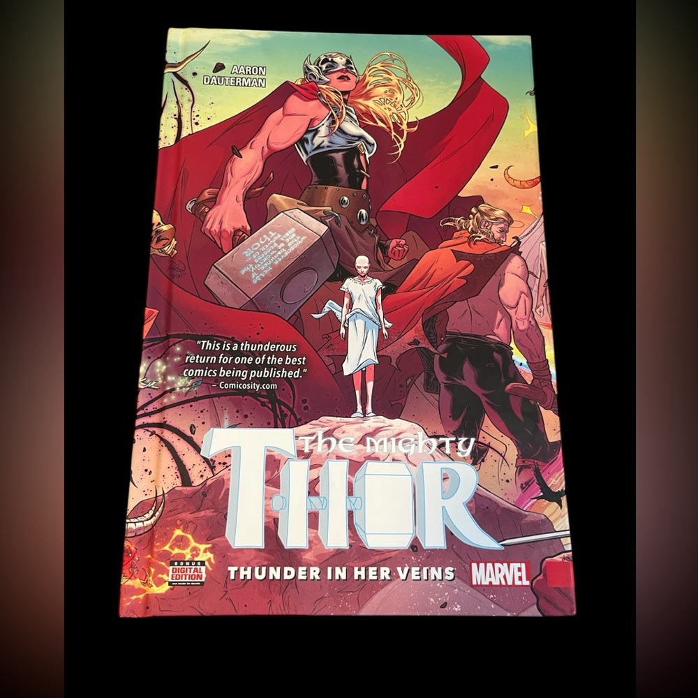 Marvel Hardcover The Mighty Thor Thunder in Her Veins book. EUC
